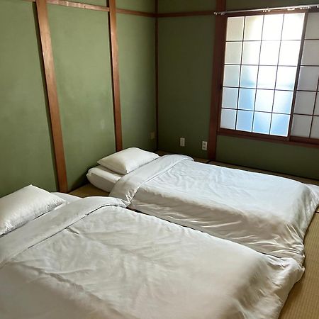 Отель Kix House Waraku III 和楽三号館 Идзумисано Экстерьер фото