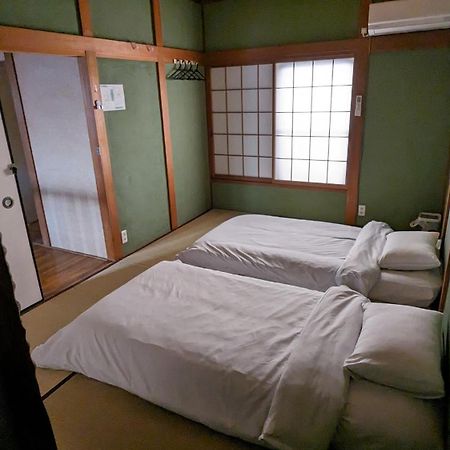 Отель Kix House Waraku III 和楽三号館 Идзумисано Экстерьер фото