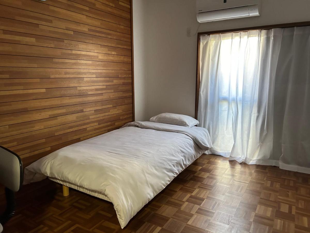 Отель Kix House Waraku III 和楽三号館 Идзумисано Экстерьер фото
