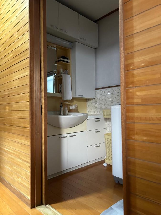 Отель Kix House Waraku III 和楽三号館 Идзумисано Экстерьер фото