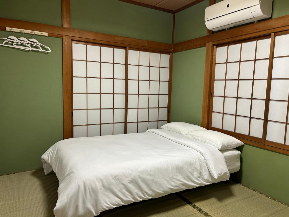 Отель Kix House Waraku III 和楽三号館 Идзумисано Экстерьер фото
