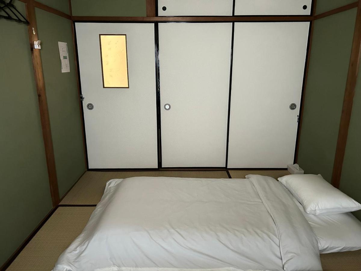 Отель Kix House Waraku III 和楽三号館 Идзумисано Экстерьер фото