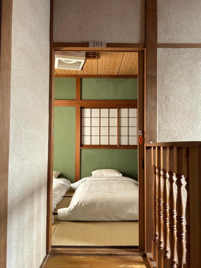 Отель Kix House Waraku III 和楽三号館 Идзумисано Экстерьер фото