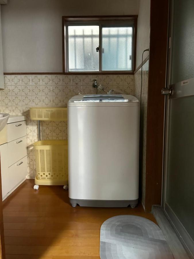 Отель Kix House Waraku III 和楽三号館 Идзумисано Экстерьер фото