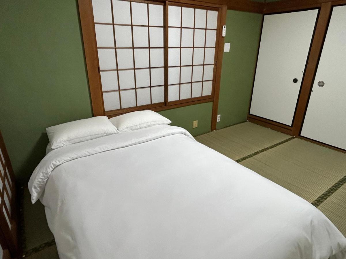 Отель Kix House Waraku III 和楽三号館 Идзумисано Экстерьер фото