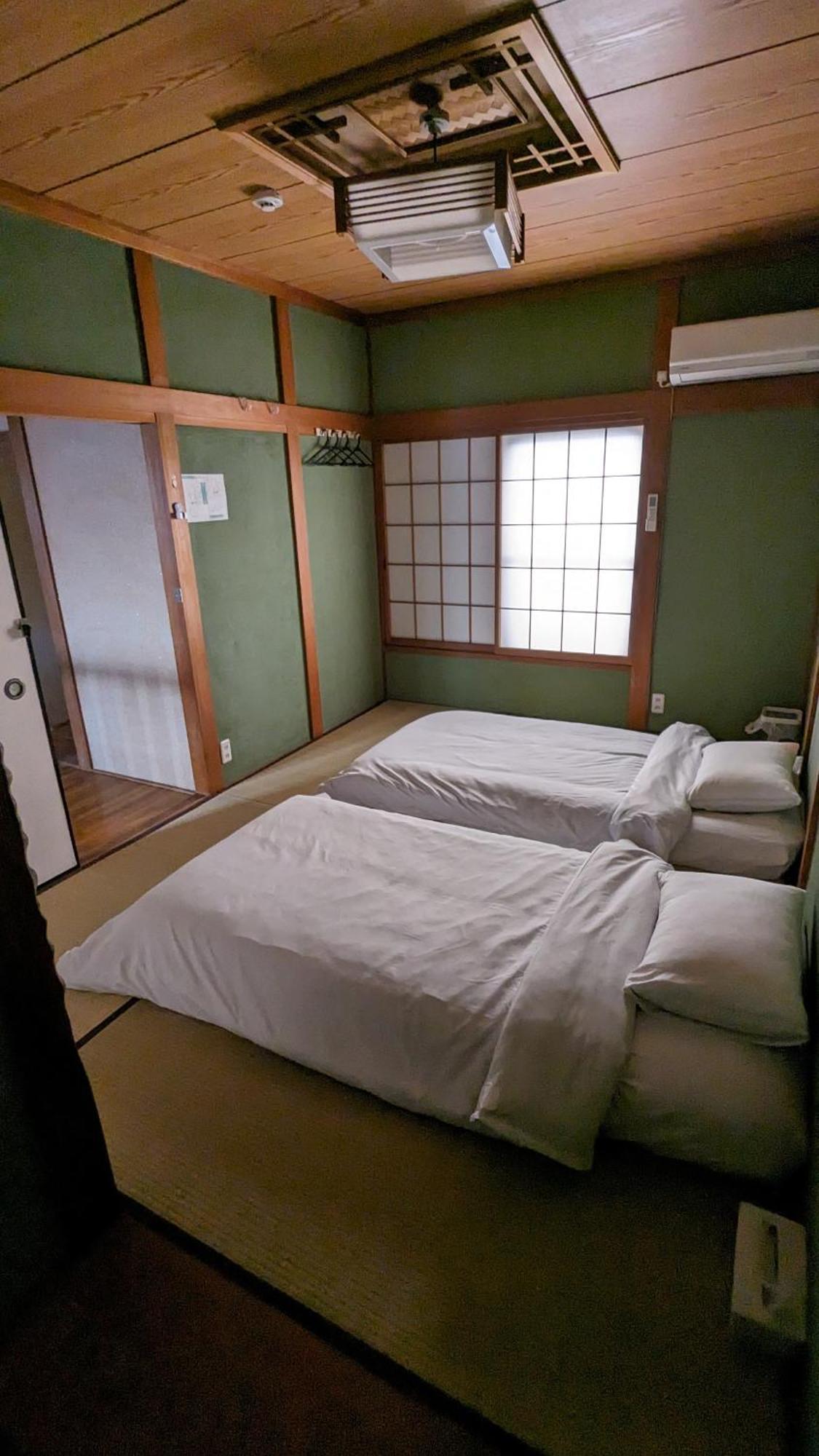 Отель Kix House Waraku III 和楽三号館 Идзумисано Экстерьер фото