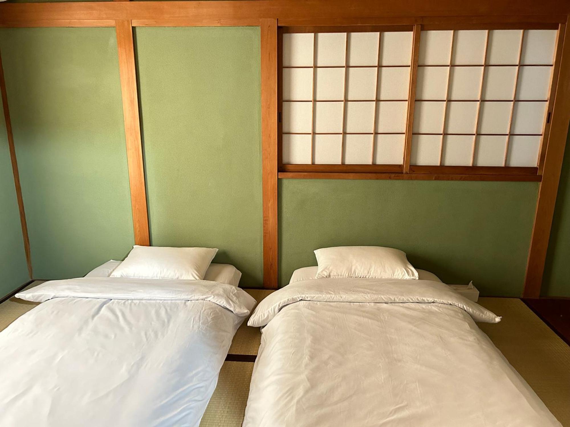 Отель Kix House Waraku III 和楽三号館 Идзумисано Экстерьер фото